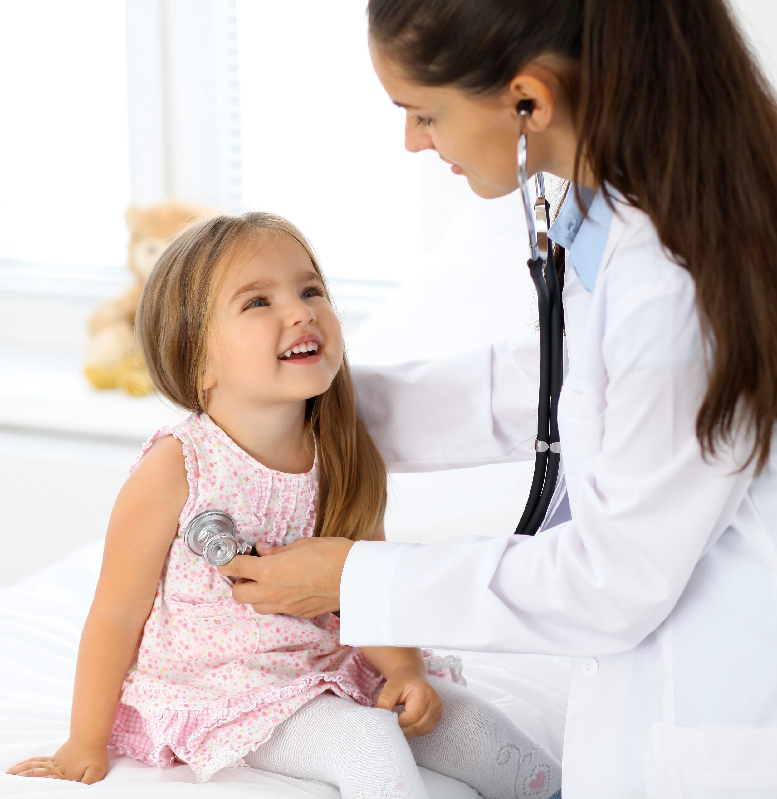 Doctor,Examining,A,Little,Girl,By,Stethoscope Doctor